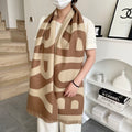 Burberry reversible two-tone wool scarf featuring a circular logo design, crafted from a cotton-wool blend