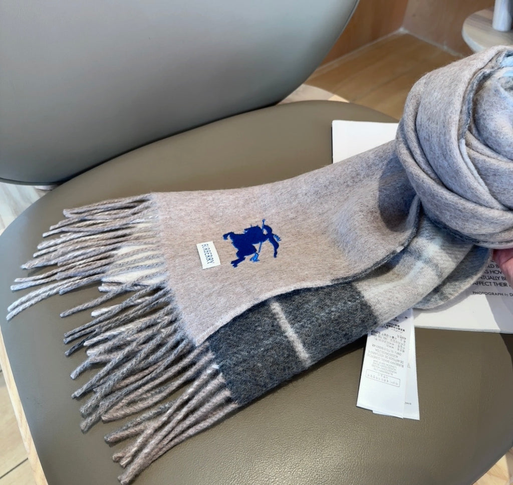 Burberry reversible two-tone wool scarf featuring a circular logo design, crafted from a cotton-wool blend