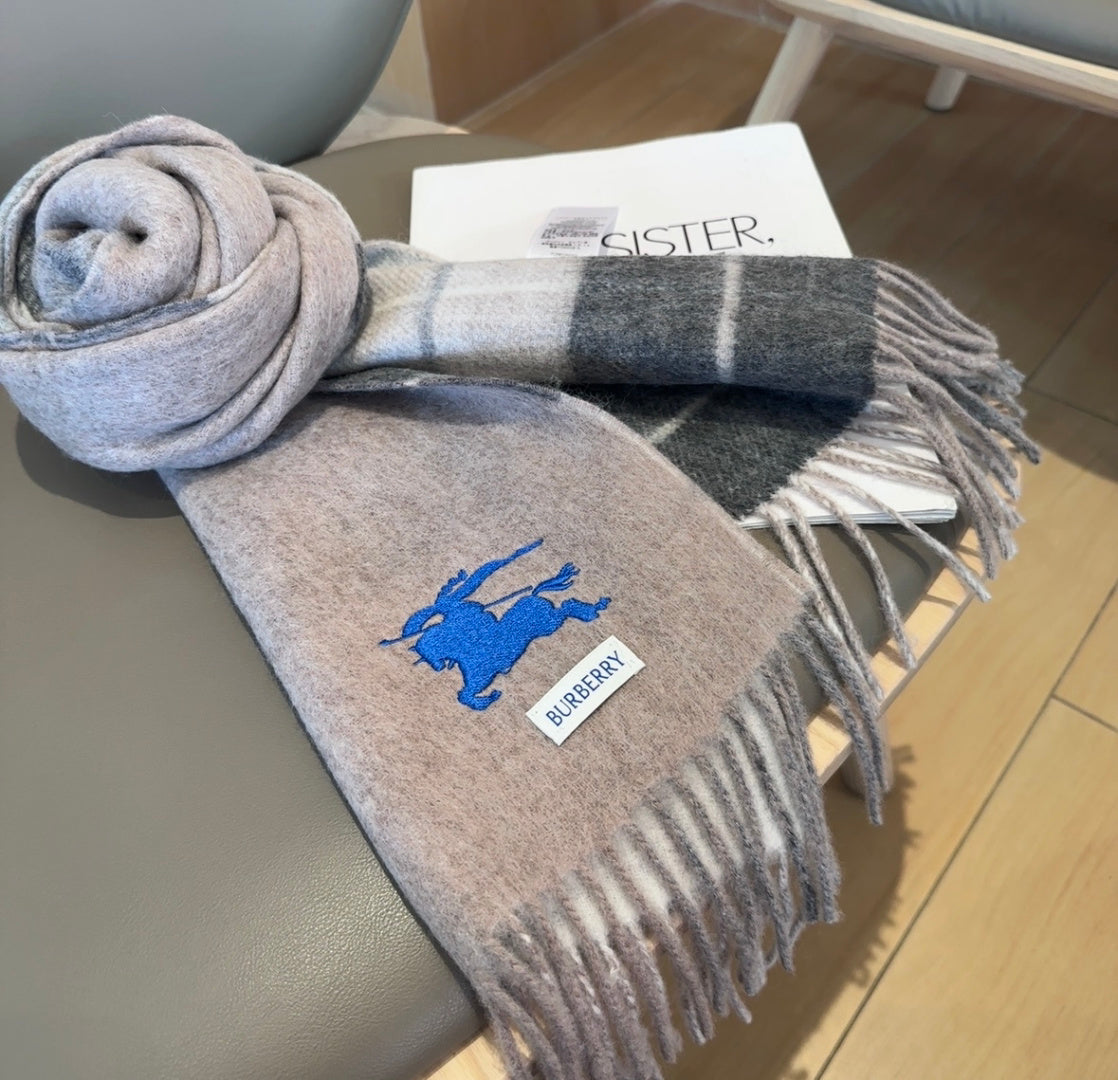 Burberry reversible two-tone wool scarf featuring a circular logo design, crafted from a cotton-wool blend