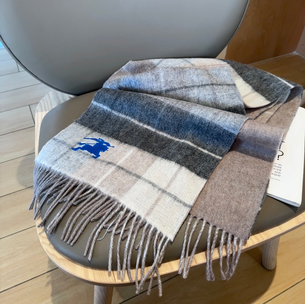 Burberry reversible two-tone wool scarf featuring a circular logo design, crafted from a cotton-wool blend