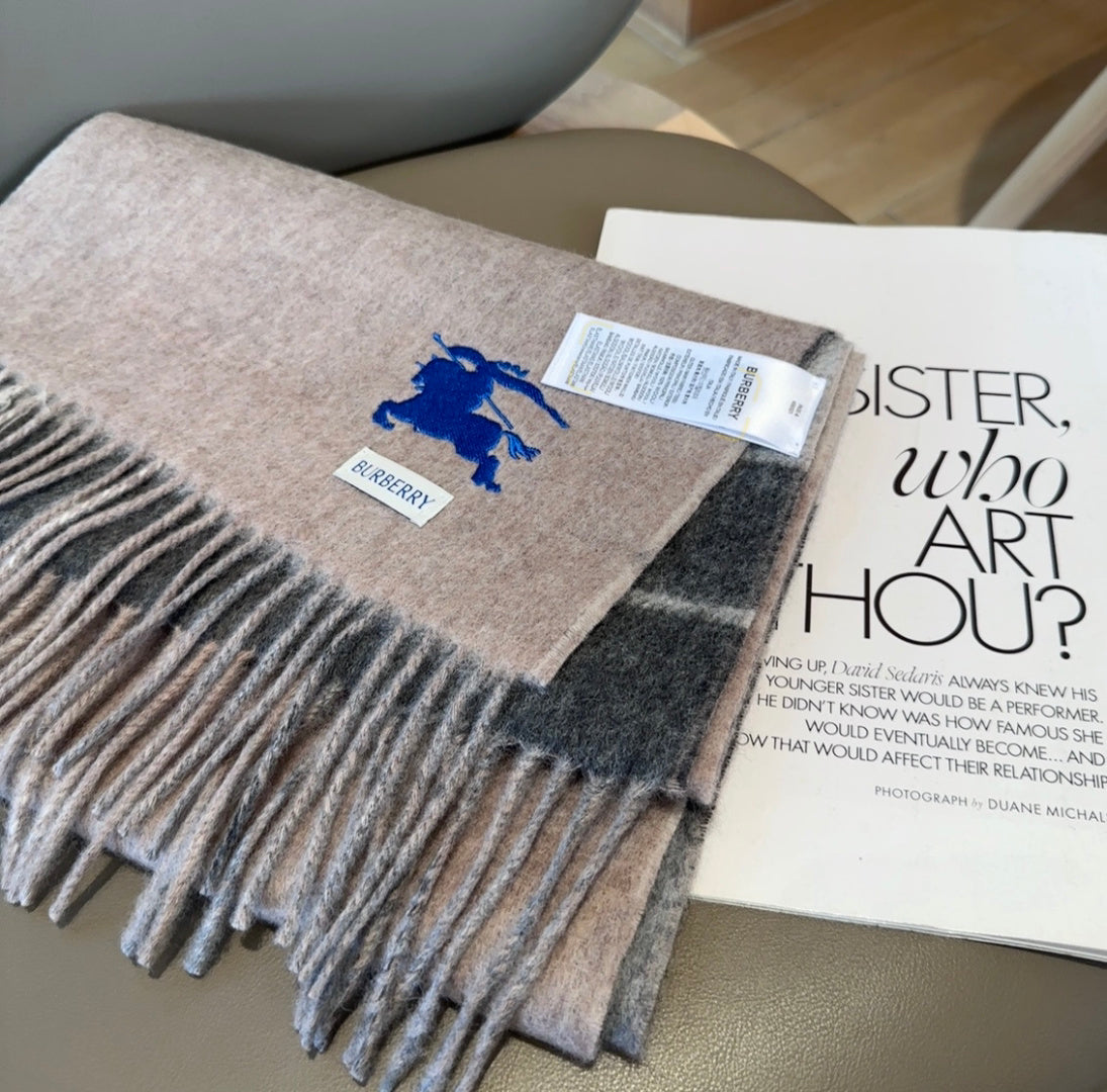 Burberry reversible two-tone wool scarf featuring a circular logo design, crafted from a cotton-wool blend