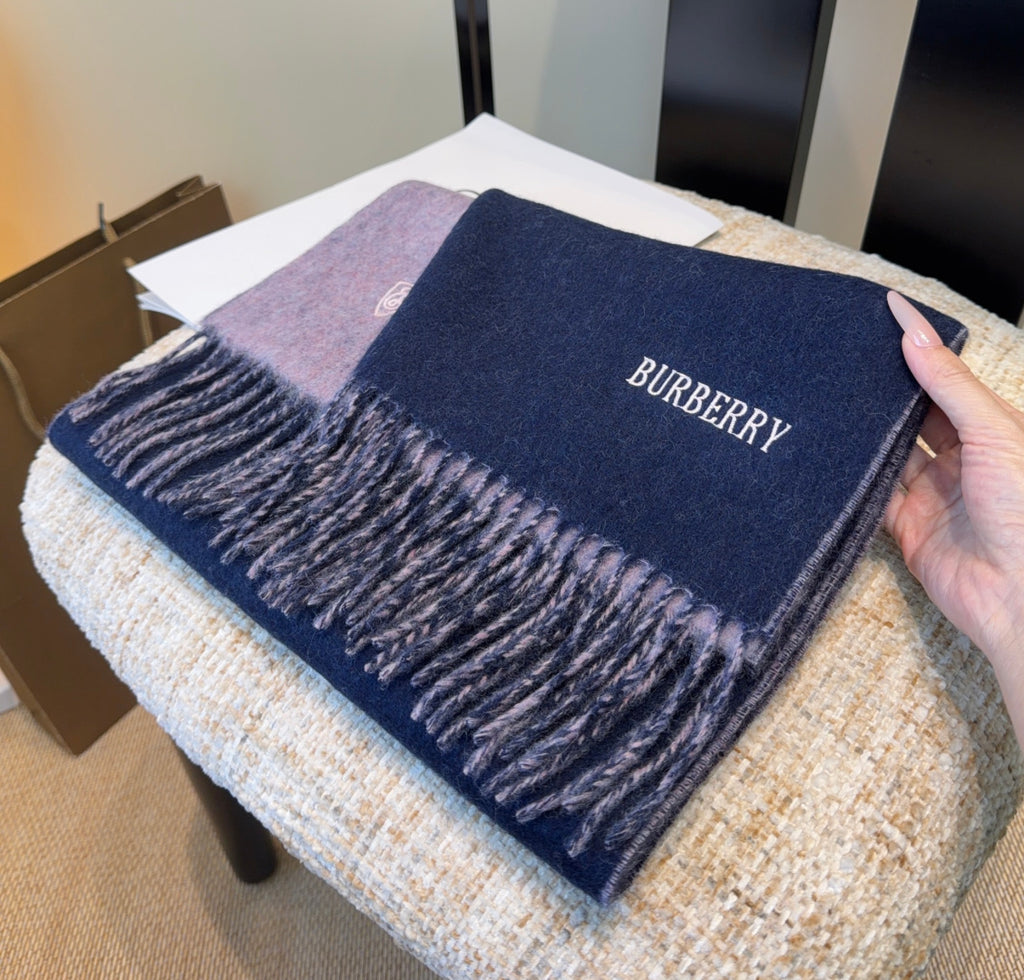 Burberry reversible two-tone wool scarf featuring a circular logo design, crafted from a cotton-wool blend