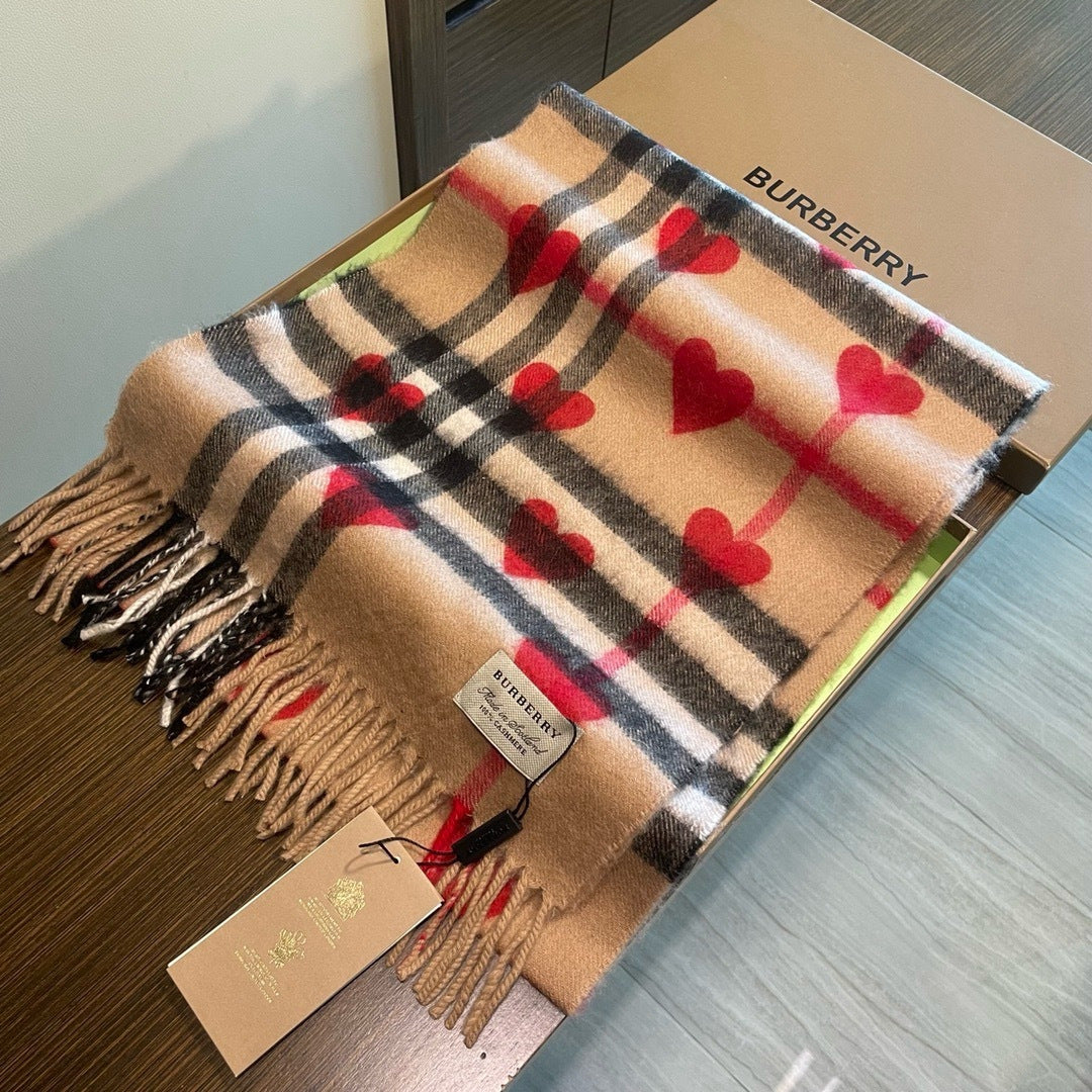Burberry reversible two-tone wool scarf featuring a circular logo design, crafted from a cotton-wool blend