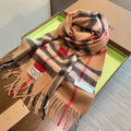 Burberry reversible two-tone wool scarf featuring a circular logo design, crafted from a cotton-wool blend