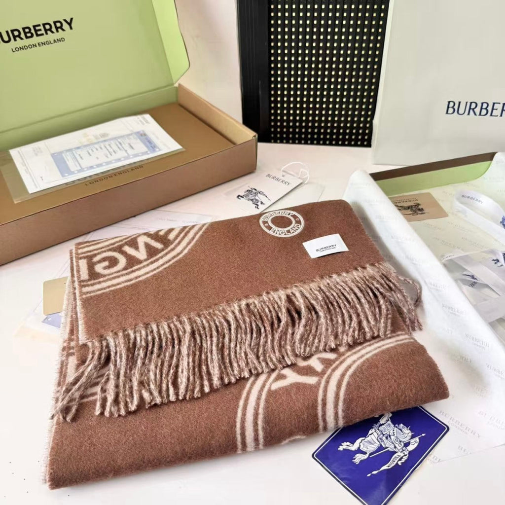 Burberry reversible two-tone wool scarf featuring a circular logo design, crafted from a cotton-wool blend