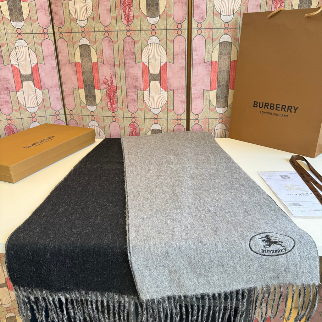 Burberry reversible two-tone wool scarf featuring a circular logo design, crafted from a cotton-wool blend