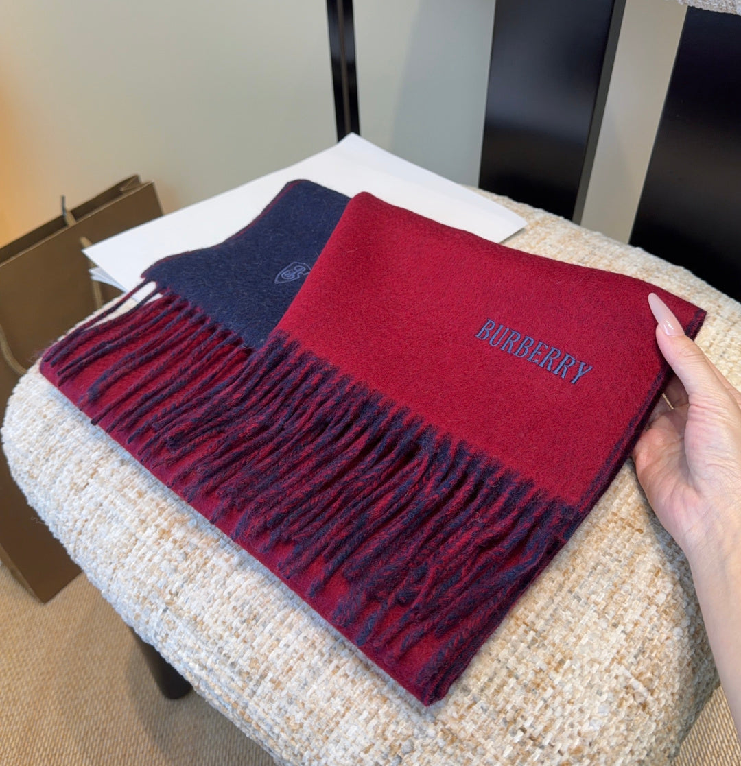 Burberry reversible two-tone wool scarf featuring a circular logo design, crafted from a cotton-wool blend