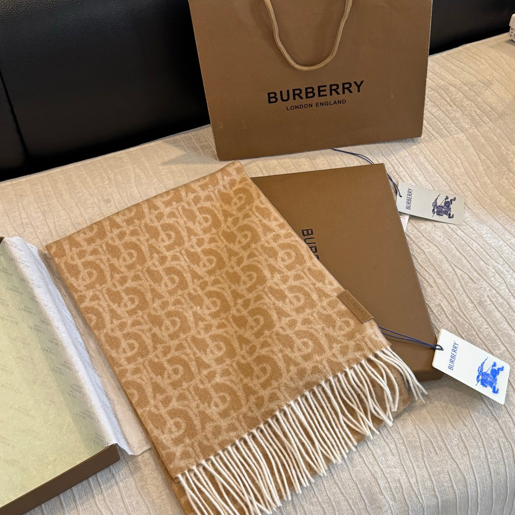 Burberry reversible two-tone wool scarf featuring a circular logo design, crafted from a cotton-wool blend