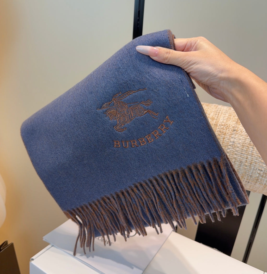 Burberry reversible two-tone wool scarf featuring a circular logo design, crafted from a cotton-wool blend