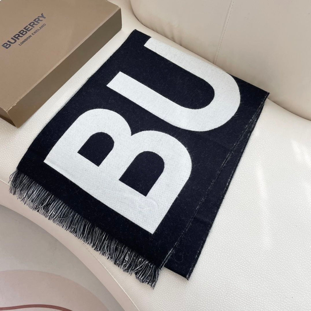 Burberry reversible two-tone wool scarf featuring a circular logo design, crafted from a cotton-wool blend