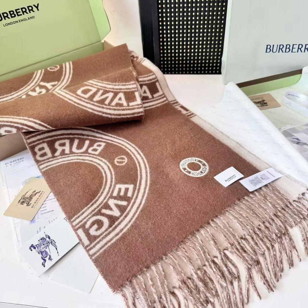 Burberry reversible two-tone wool scarf featuring a circular logo design, crafted from a cotton-wool blend