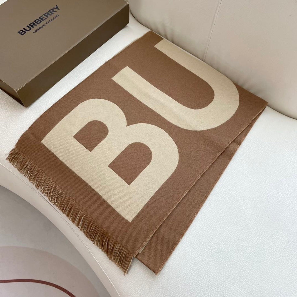 Burberry reversible two-tone wool scarf featuring a circular logo design, crafted from a cotton-wool blend