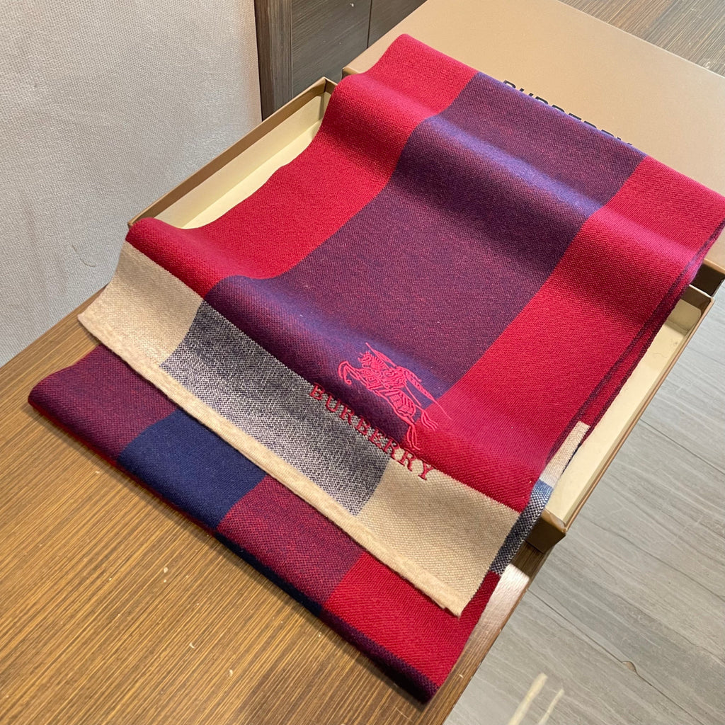 Burberry reversible two-tone wool scarf featuring a circular logo design, crafted from a cotton-wool blend
