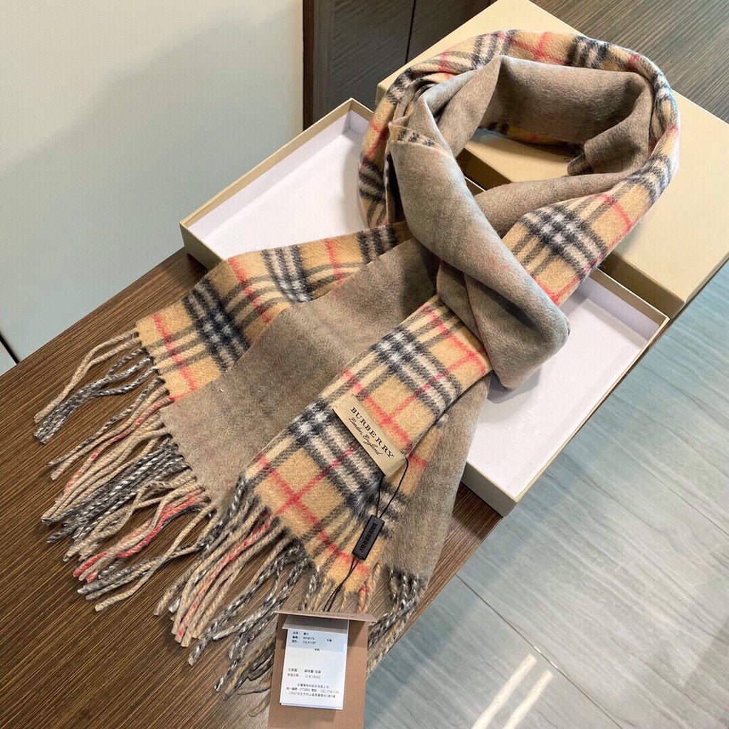 Burberry reversible two-tone wool scarf featuring a circular logo design, crafted from a cotton-wool blend