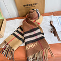 Burberry reversible two-tone wool scarf featuring a circular logo design, crafted from a cotton-wool blend
