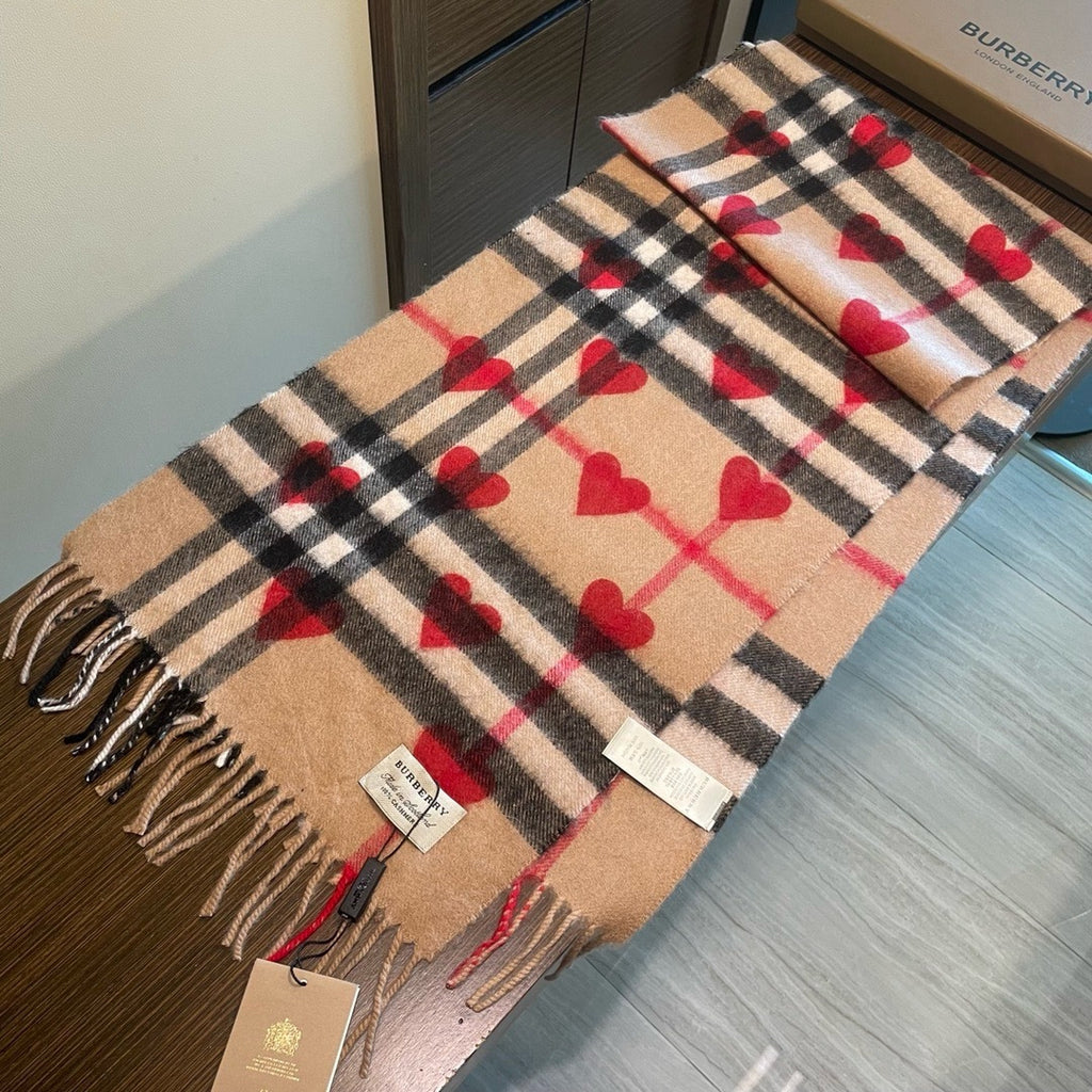 Burberry reversible two-tone wool scarf featuring a circular logo design, crafted from a cotton-wool blend