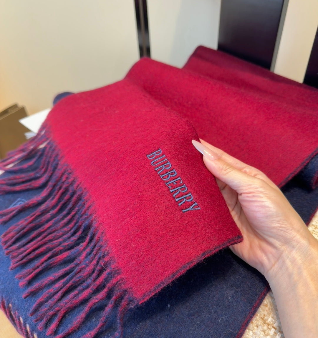 Burberry reversible two-tone wool scarf featuring a circular logo design, crafted from a cotton-wool blend