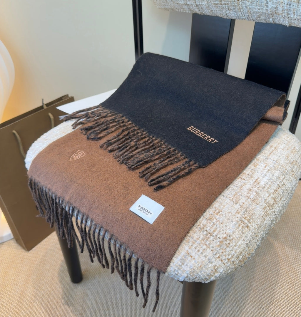 Burberry reversible two-tone wool scarf featuring a circular logo design, crafted from a cotton-wool blend