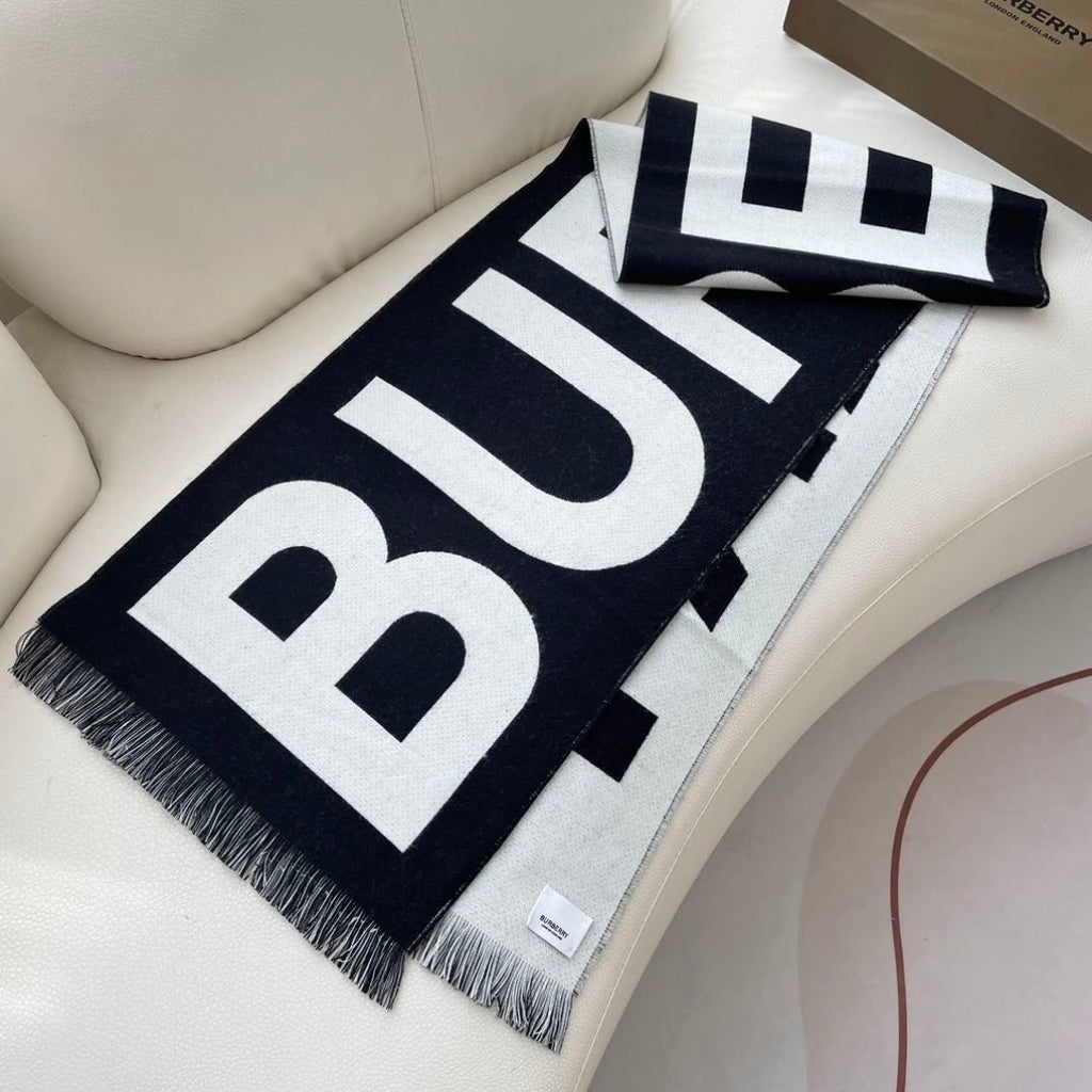 Burberry reversible two-tone wool scarf featuring a circular logo design, crafted from a cotton-wool blend