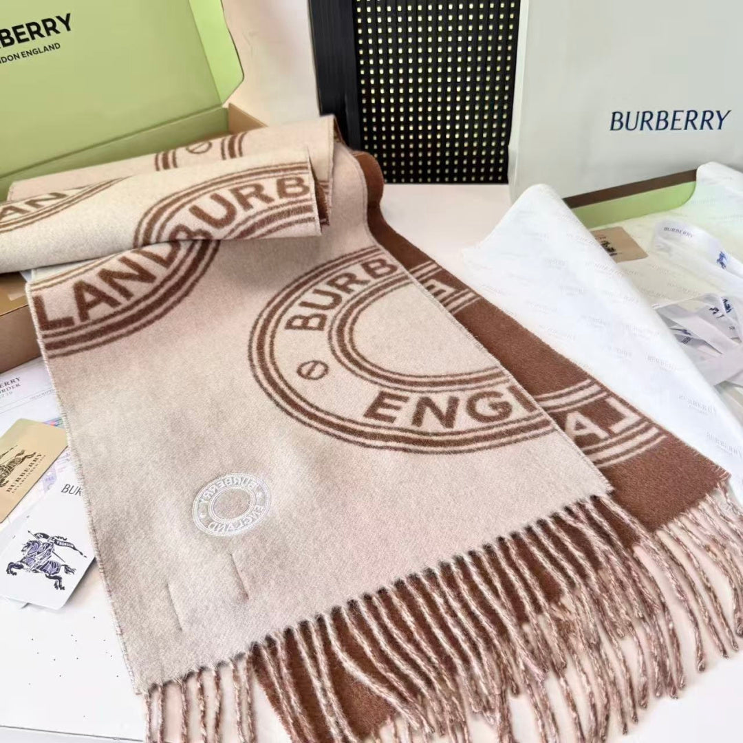 Burberry reversible two-tone wool scarf featuring a circular logo design, crafted from a cotton-wool blend