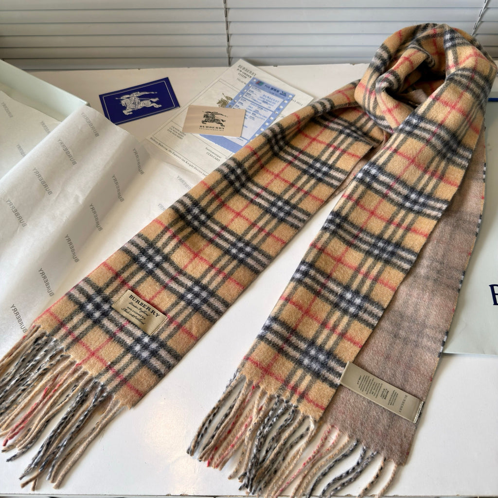 Burberry reversible two-tone wool scarf featuring a circular logo design, crafted from a cotton-wool blend