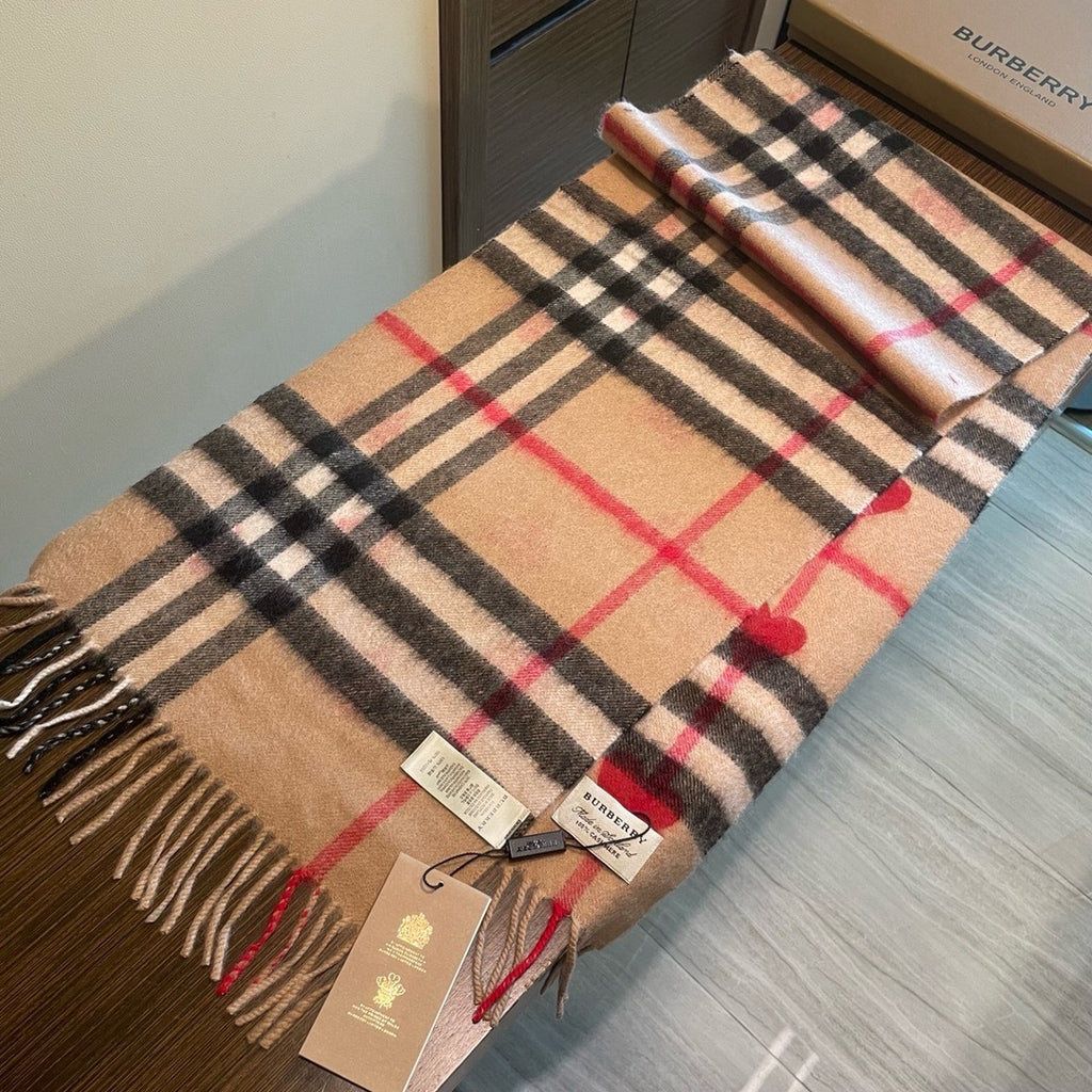 Burberry reversible two-tone wool scarf featuring a circular logo design, crafted from a cotton-wool blend