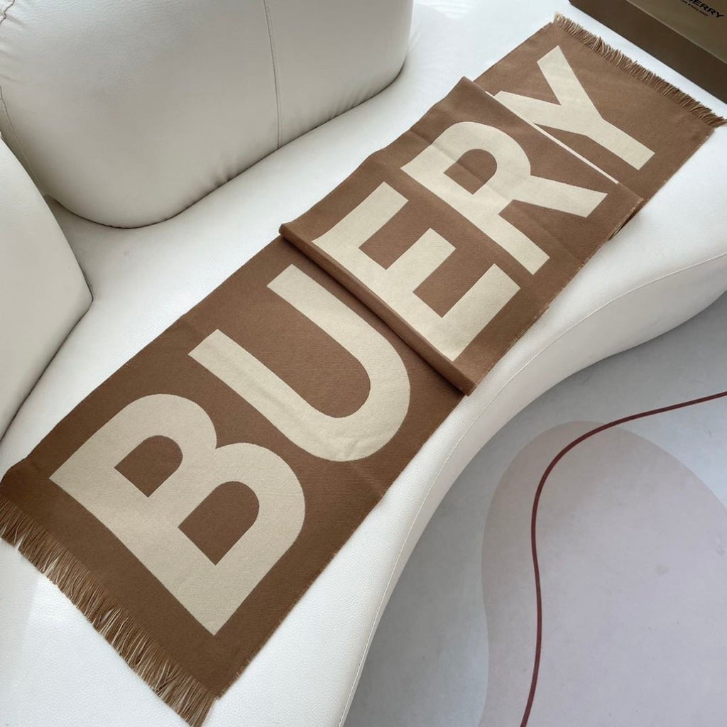 Burberry reversible two-tone wool scarf featuring a circular logo design, crafted from a cotton-wool blend