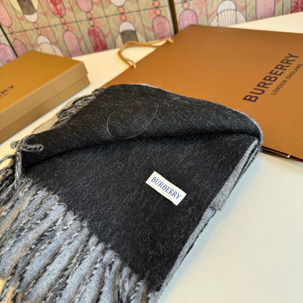 Burberry reversible two-tone wool scarf featuring a circular logo design, crafted from a cotton-wool blend