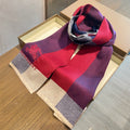 Burberry reversible two-tone wool scarf featuring a circular logo design, crafted from a cotton-wool blend