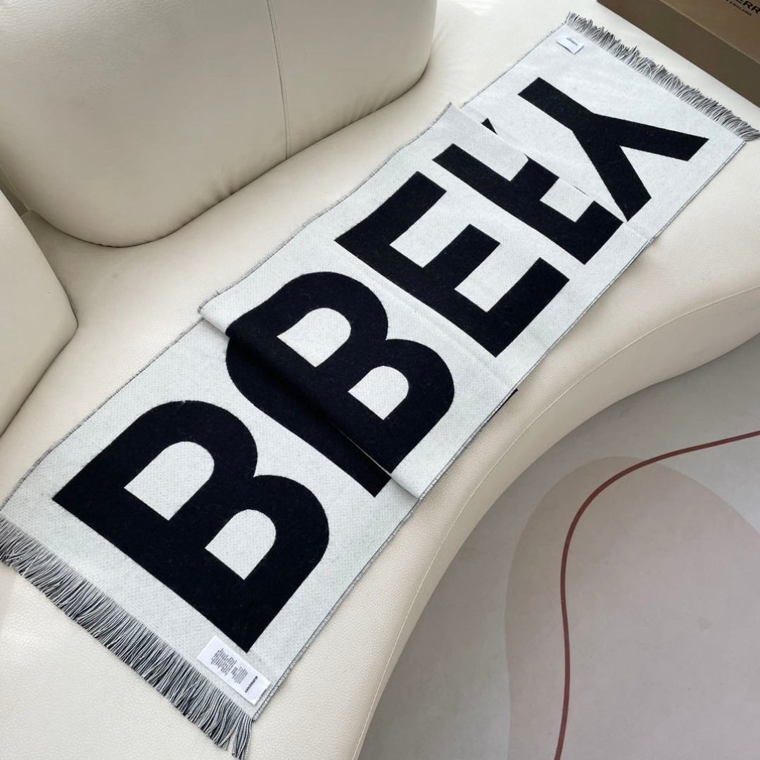 Burberry reversible two-tone wool scarf featuring a circular logo design, crafted from a cotton-wool blend