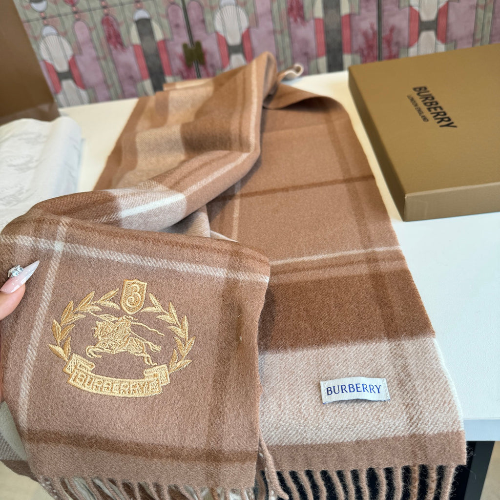 Burberry reversible two-tone wool scarf featuring a circular logo design, crafted from a cotton-wool blend
