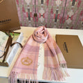 Burberry reversible two-tone wool scarf featuring a circular logo design, crafted from a cotton-wool blend