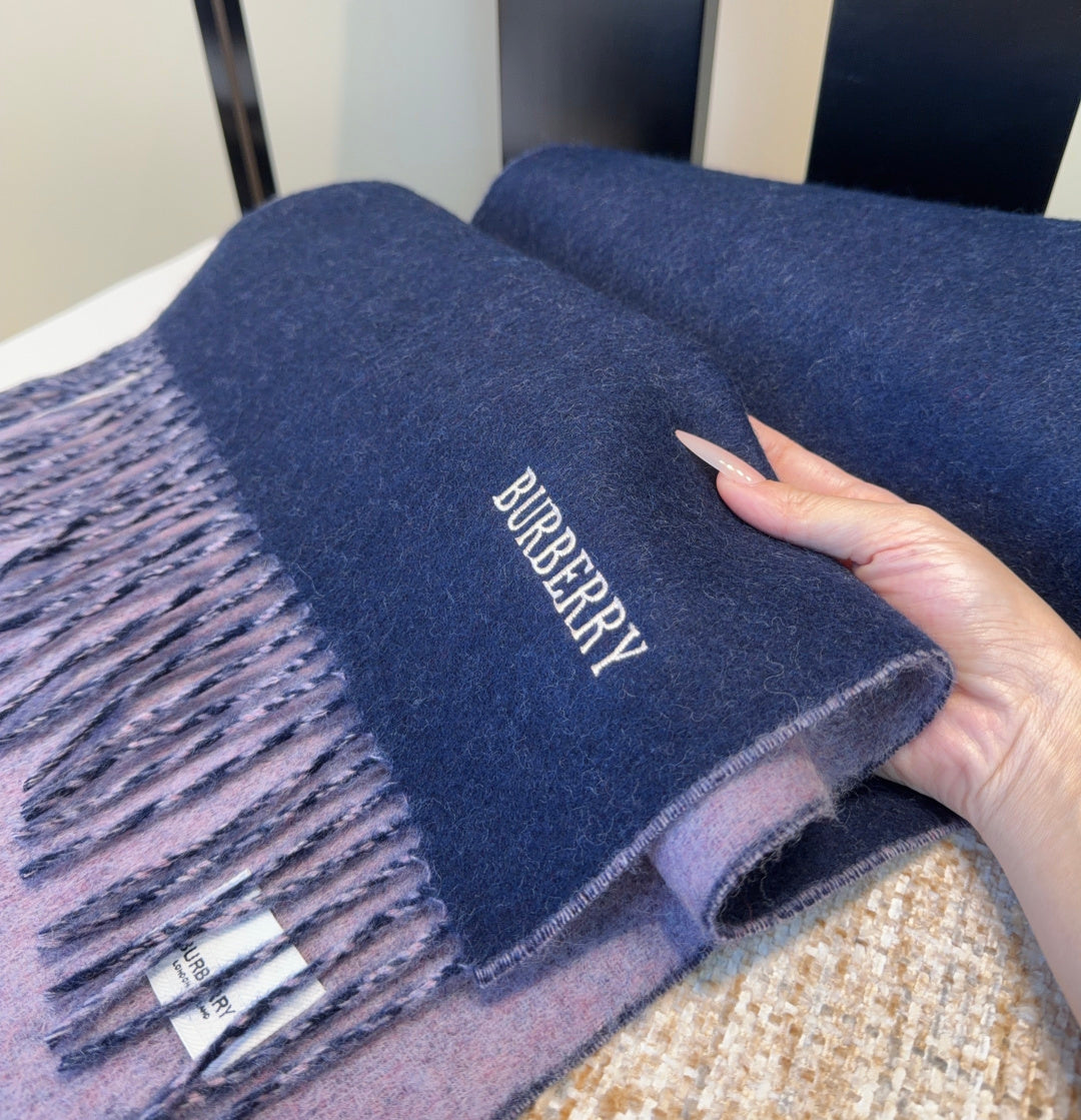 Burberry reversible two-tone wool scarf featuring a circular logo design, crafted from a cotton-wool blend