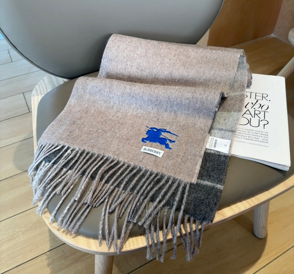 Burberry reversible two-tone wool scarf featuring a circular logo design, crafted from a cotton-wool blend