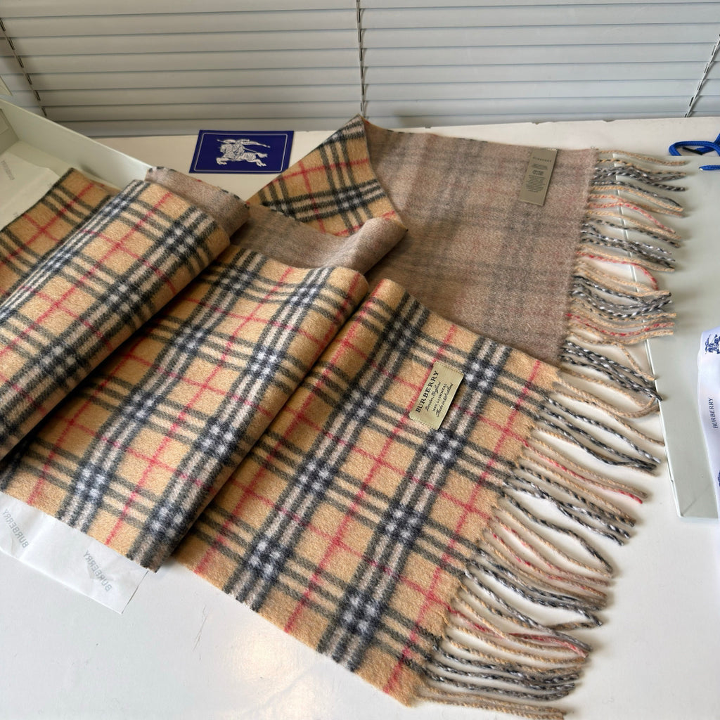 Burberry reversible two-tone wool scarf featuring a circular logo design, crafted from a cotton-wool blend