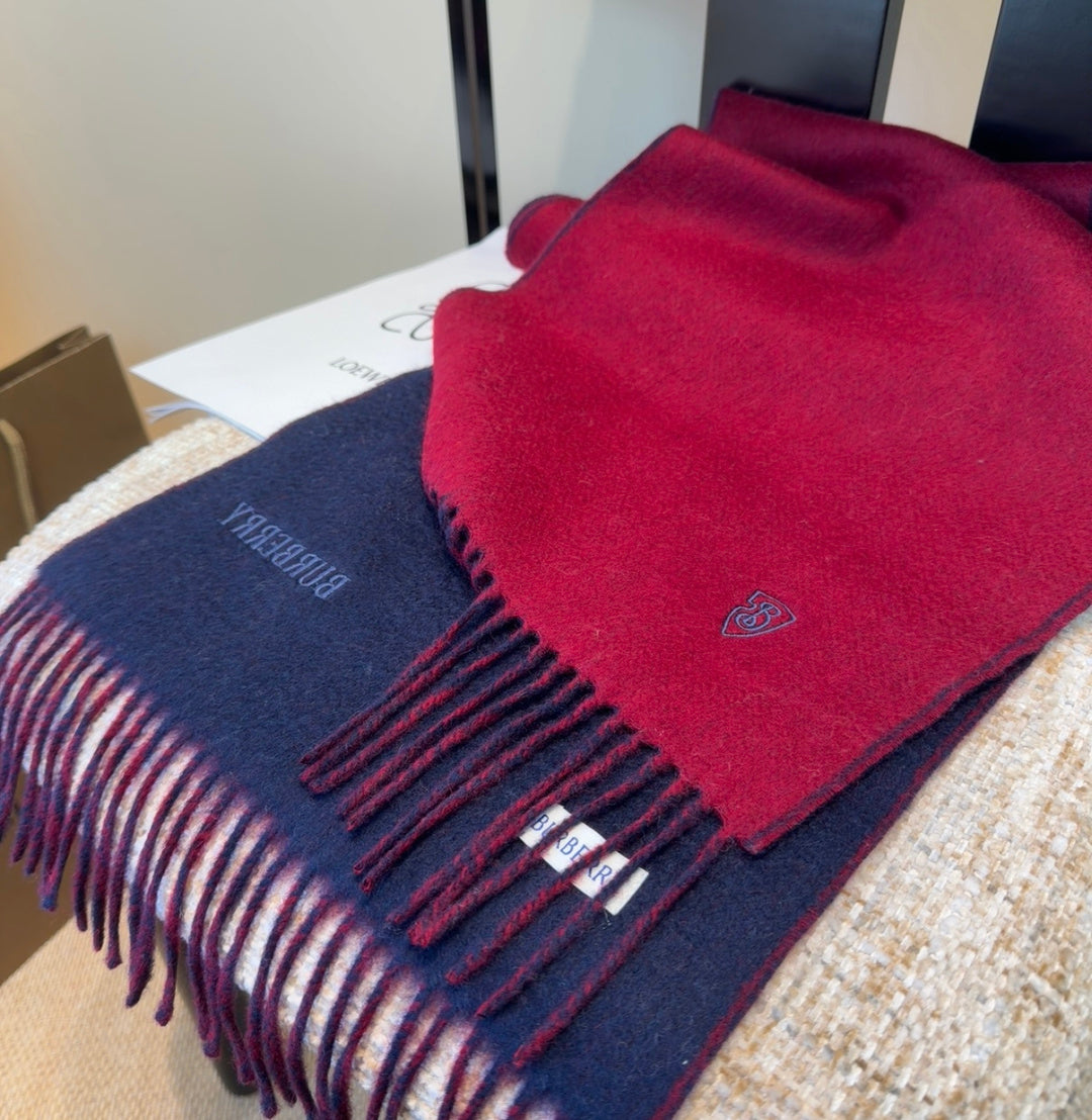 Burberry reversible two-tone wool scarf featuring a circular logo design, crafted from a cotton-wool blend