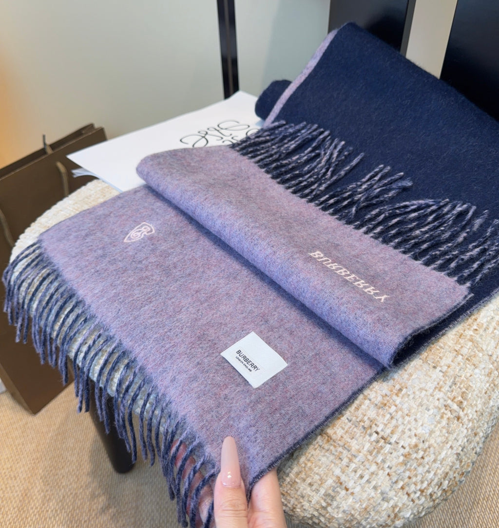 Burberry reversible two-tone wool scarf featuring a circular logo design, crafted from a cotton-wool blend