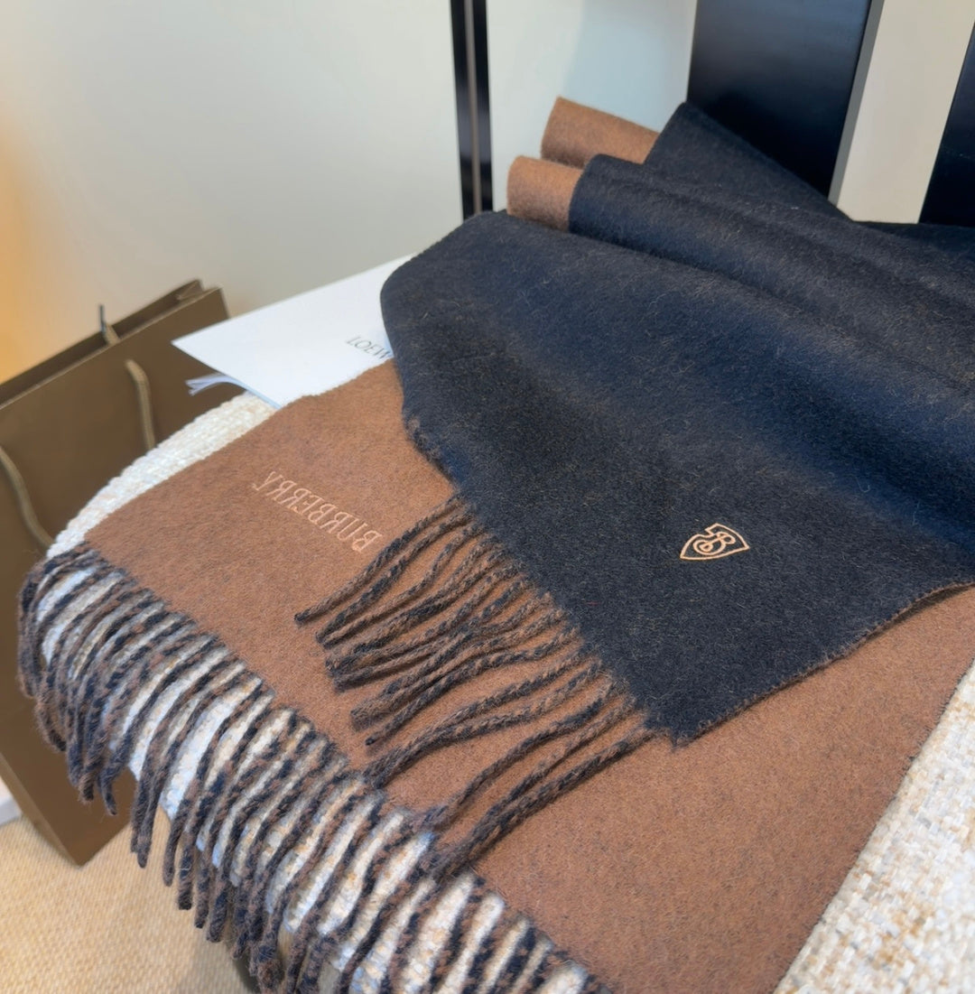 Burberry reversible two-tone wool scarf featuring a circular logo design, crafted from a cotton-wool blend