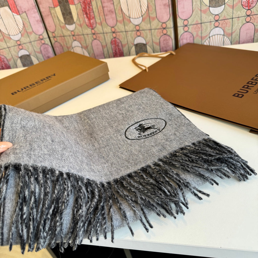 Burberry reversible two-tone wool scarf featuring a circular logo design, crafted from a cotton-wool blend