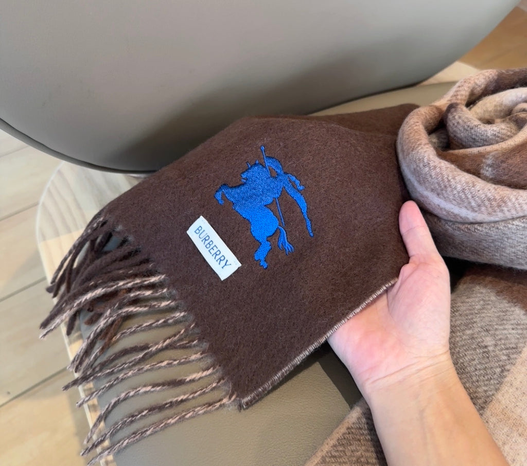 Burberry reversible two-tone wool scarf featuring a circular logo design, crafted from a cotton-wool blend