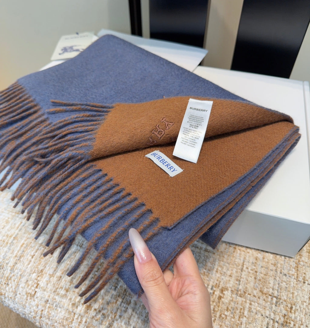Burberry reversible two-tone wool scarf featuring a circular logo design, crafted from a cotton-wool blend