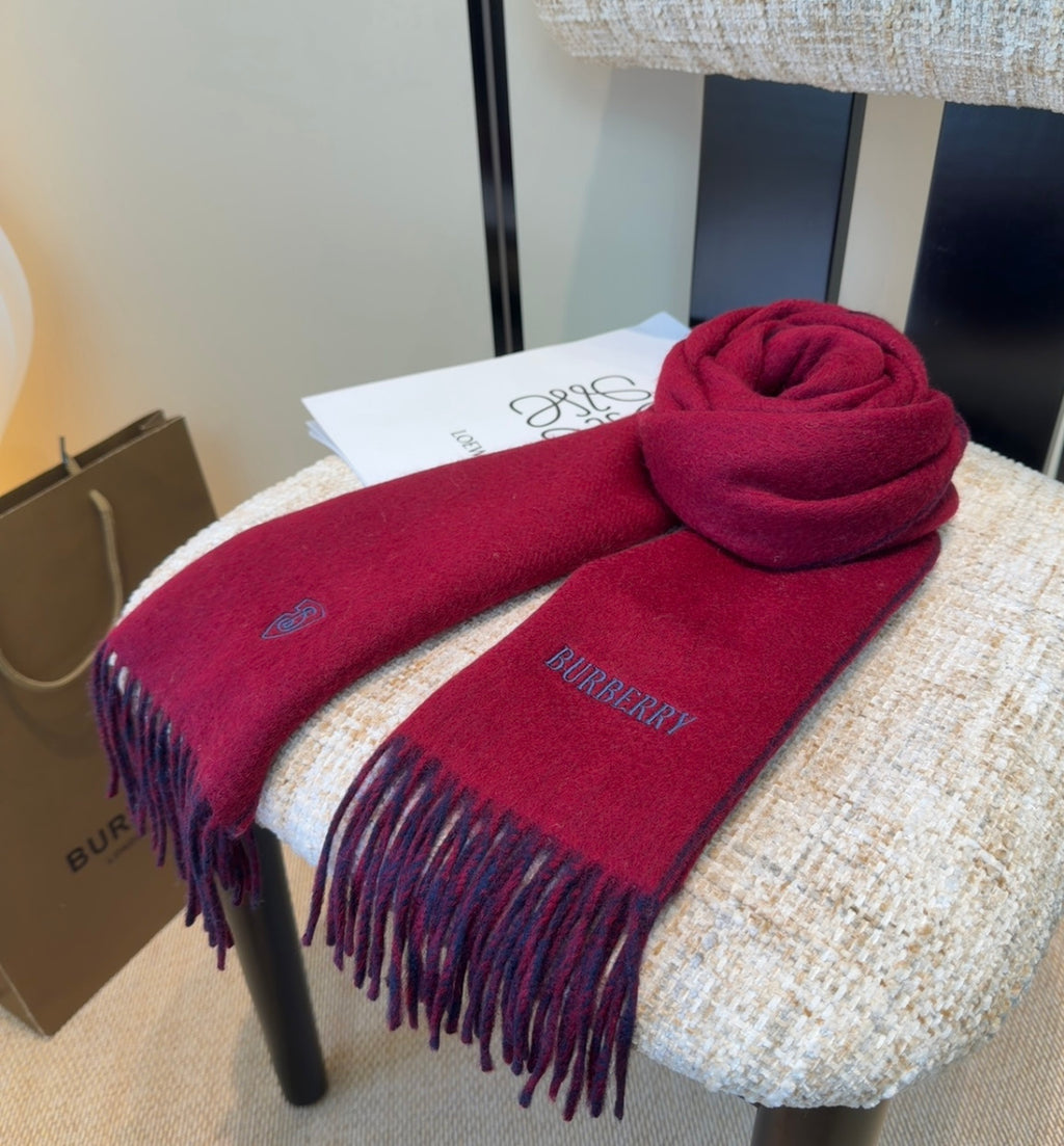 Burberry reversible two-tone wool scarf featuring a circular logo design, crafted from a cotton-wool blend