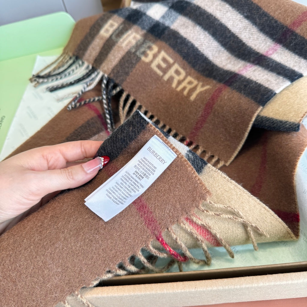 Burberry reversible two-tone wool scarf featuring a circular logo design, crafted from a cotton-wool blend