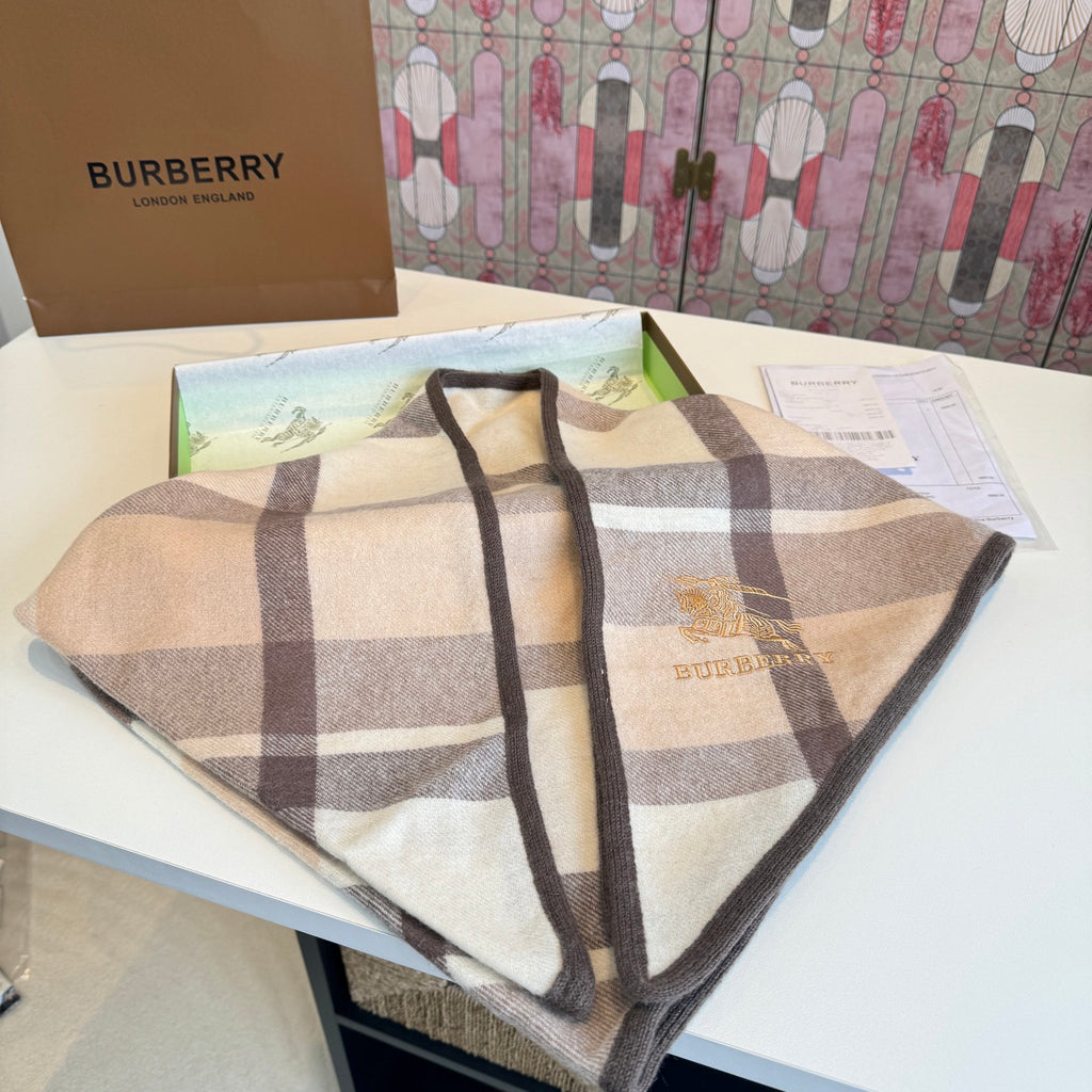 Burberry reversible two-tone wool scarf featuring a circular logo design, crafted from a cotton-wool blend