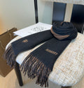 Burberry reversible two-tone wool scarf featuring a circular logo design, crafted from a cotton-wool blend
