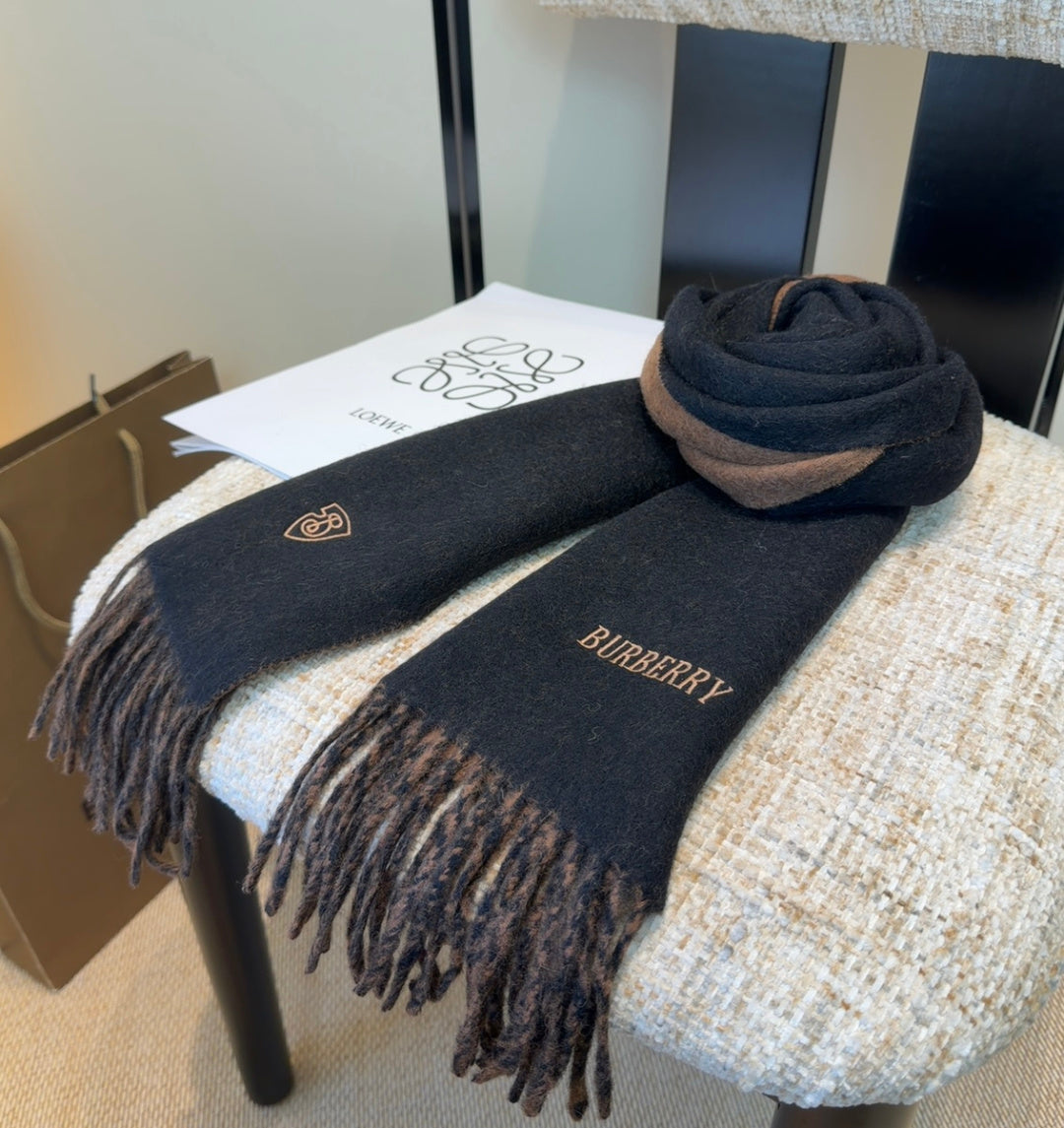 Burberry reversible two-tone wool scarf featuring a circular logo design, crafted from a cotton-wool blend