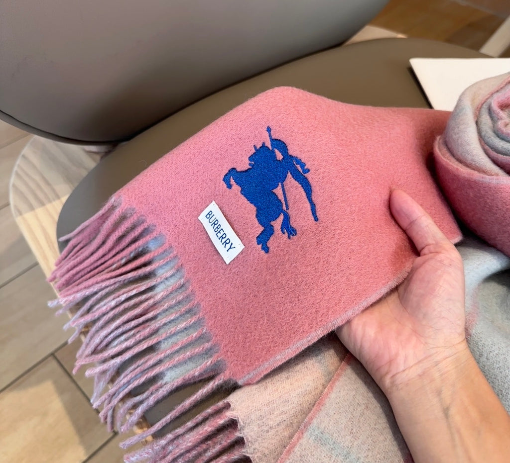 Burberry reversible two-tone wool scarf featuring a circular logo design, crafted from a cotton-wool blend