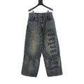Balenciaga Distressed Loose-Fit Jeans with Leg Patch Detail